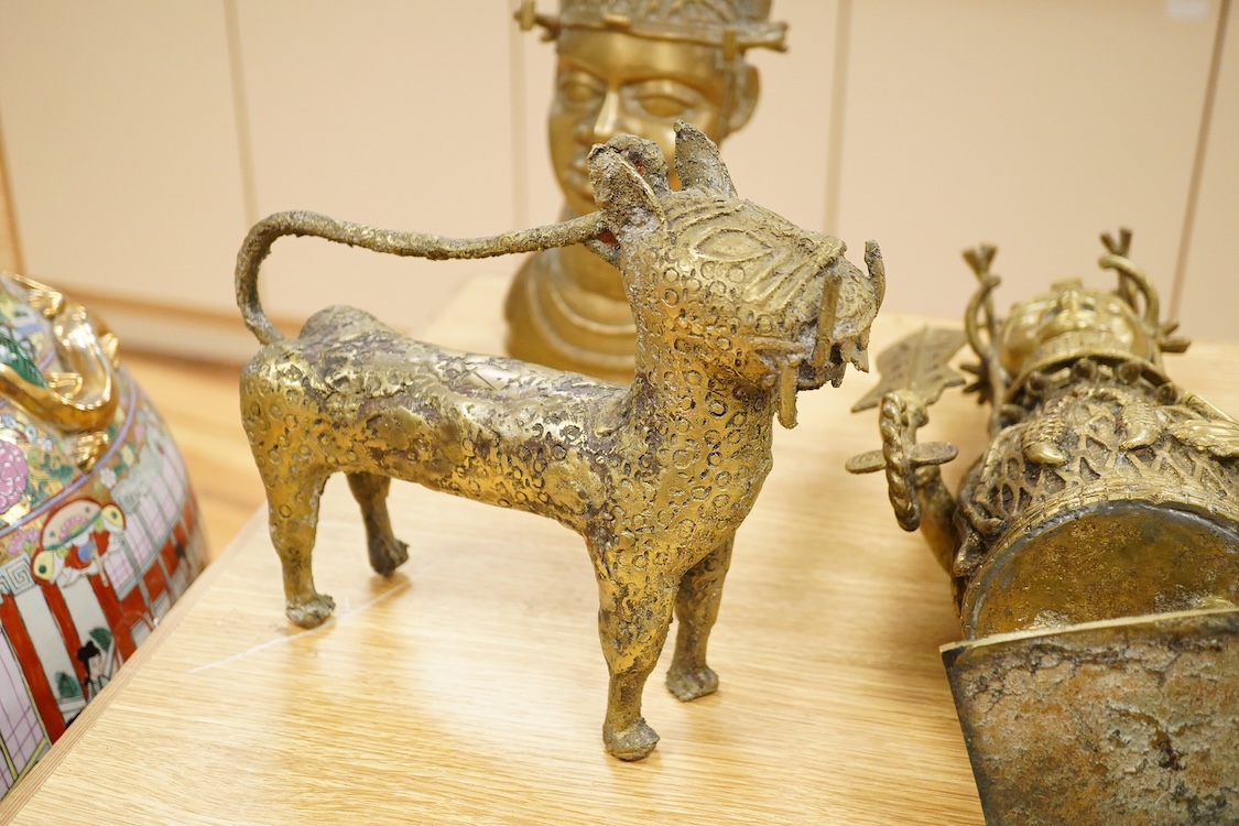 Three Benin type bronzes to include a bust, largest 47cm high